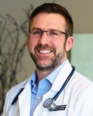 Dr. Romansik